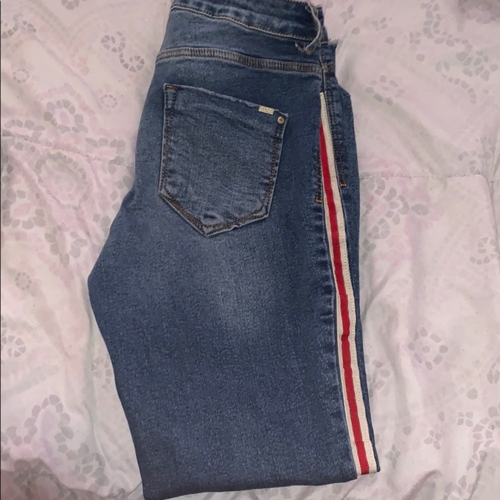 Denim jeans with stripes on the side